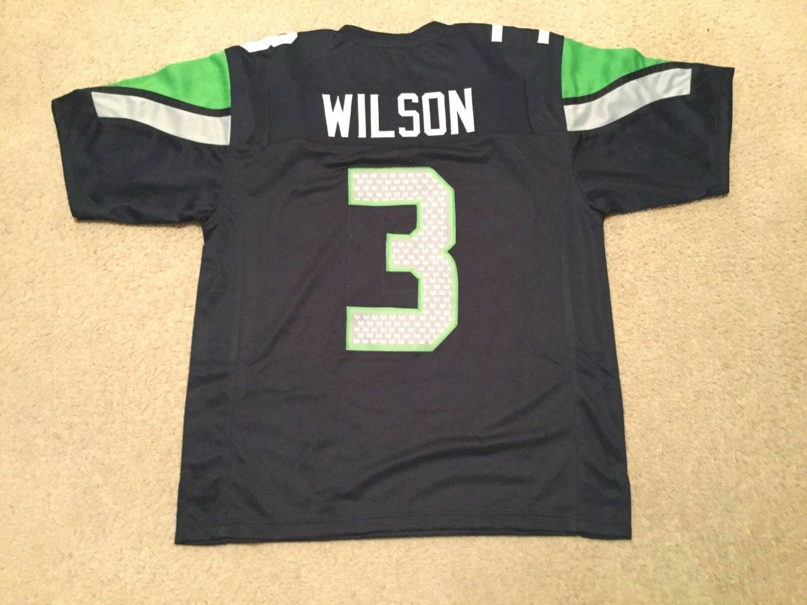 UNSIGNED CUSTOM Sewn Stitched Russell Wilson Blue Jersey 1 UNSIGNED CUSTOM Sewn Stitched Russell Wilson Blue Jersey